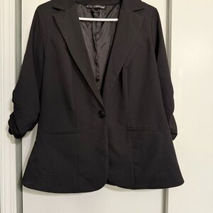 Lined black blazer with single button